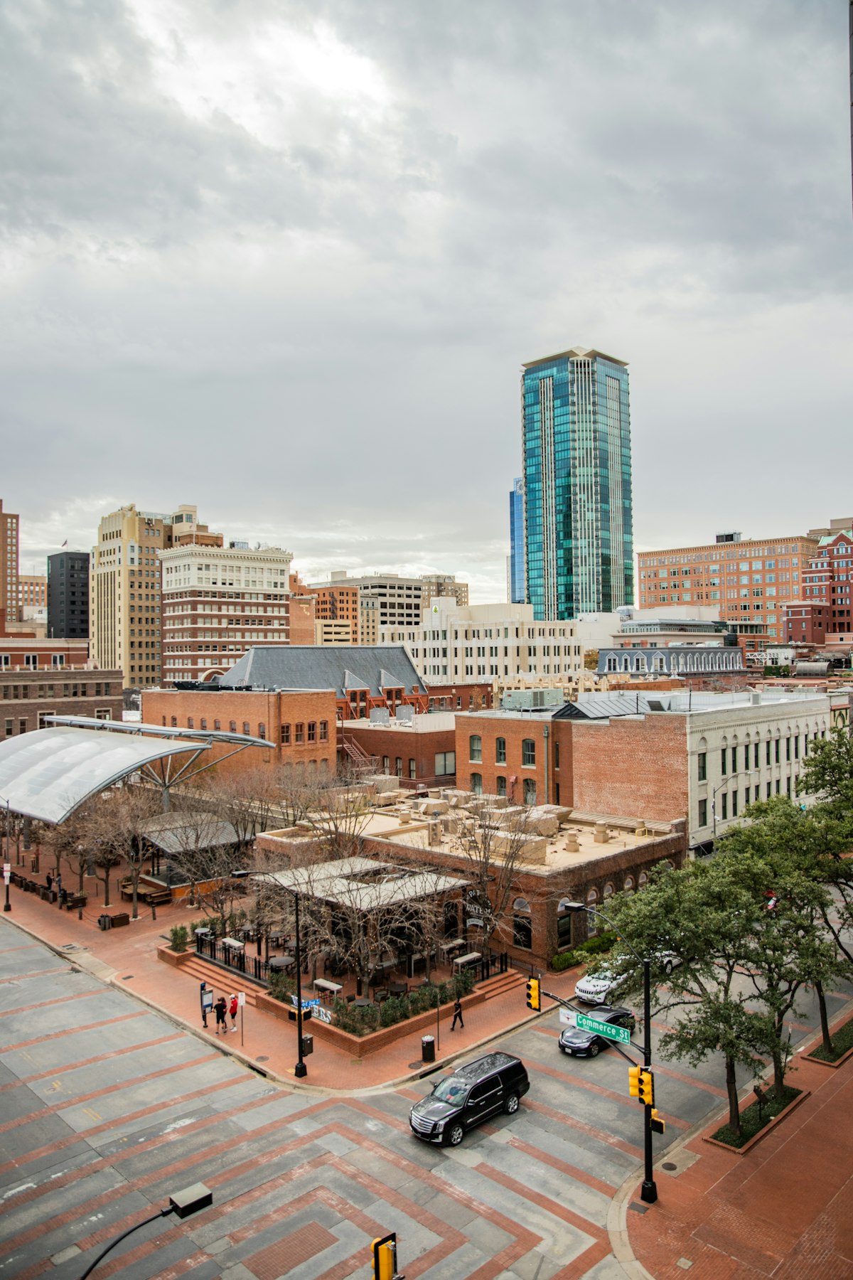 Downtown Fort Worth skyline under a cloudy Texas sky.